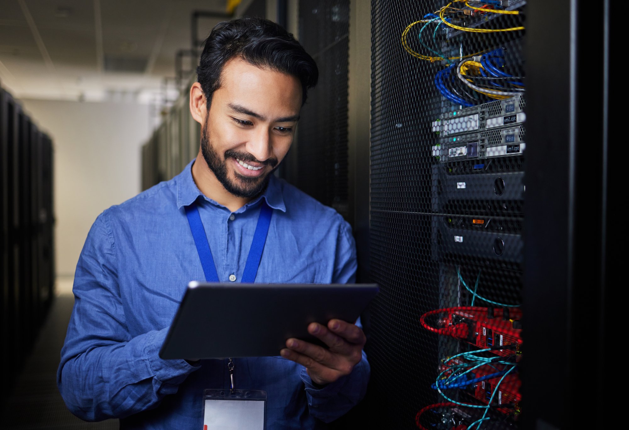 man-tablet-and-server-room-programming-or-coding-2023-08-26-08-08-23-utc
